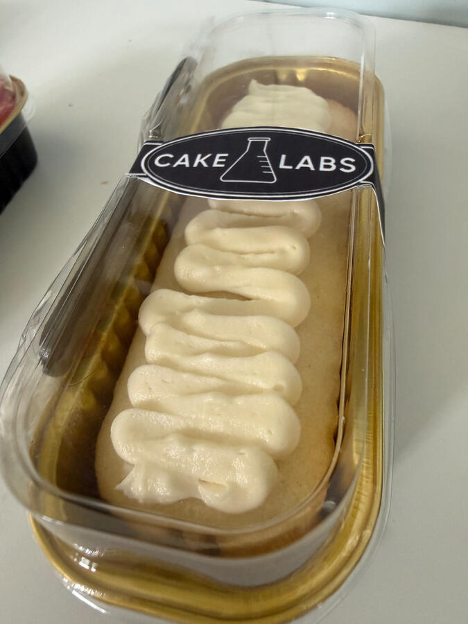 Cake Labs Blank Slate mini loaf cake with whipped white chocolate ganache.